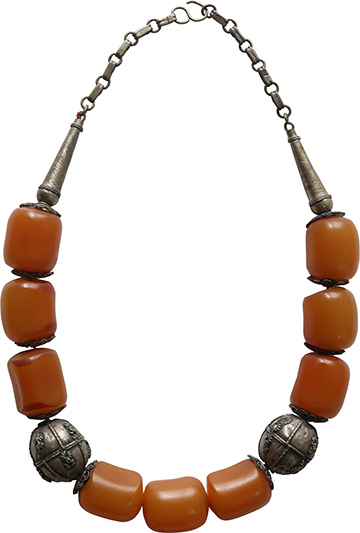 Silver necklaces with beads of amber